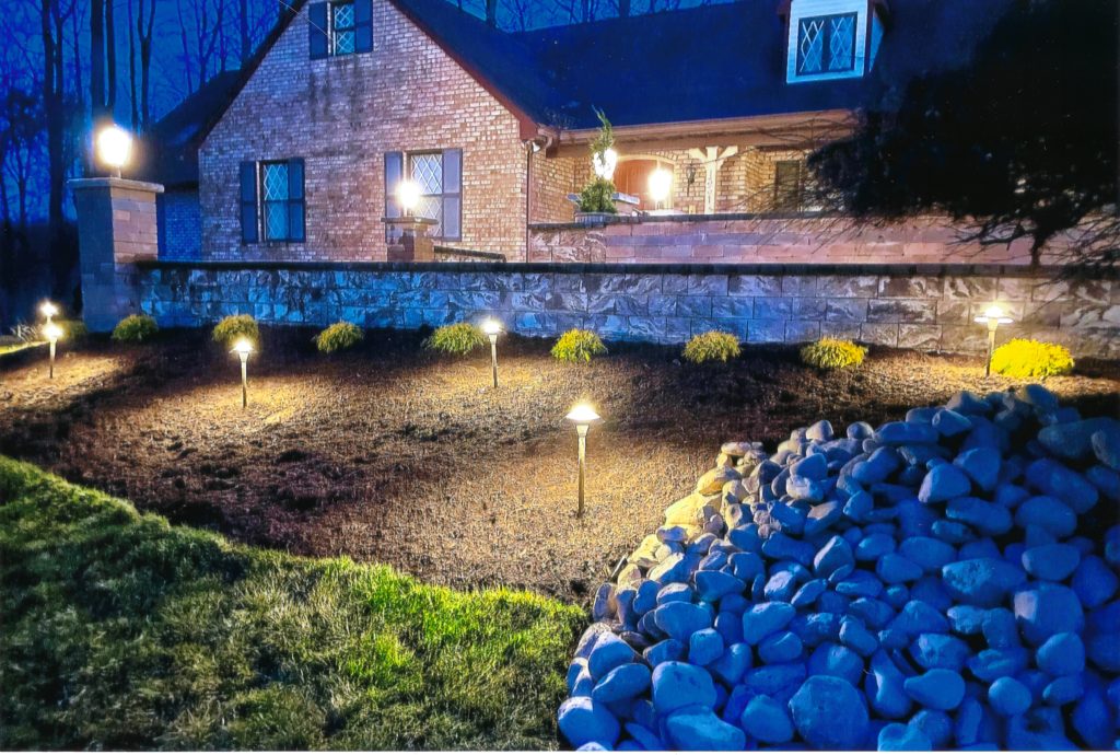 Retaining wall with lights and rocks
